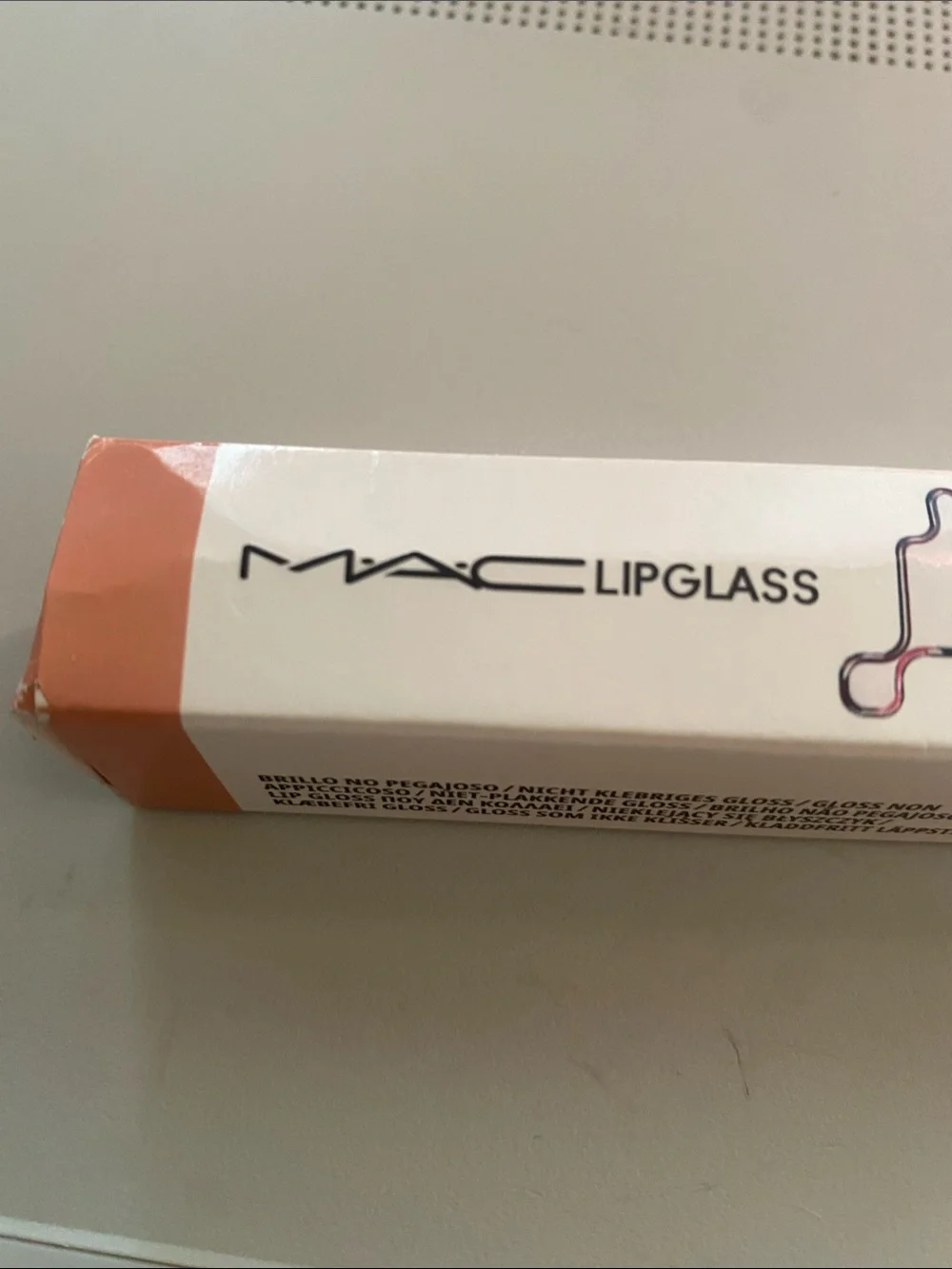 Mac lipglass pretty pale pink
